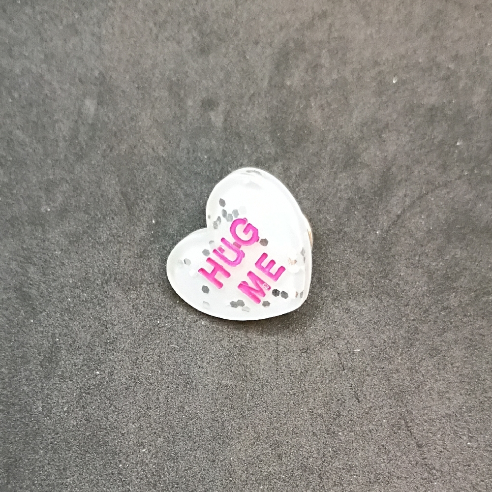 Heart Shaped 'Hug Me' Pin